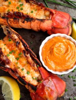 Grilled Lobster Tails with a dish of Sriracha Butter