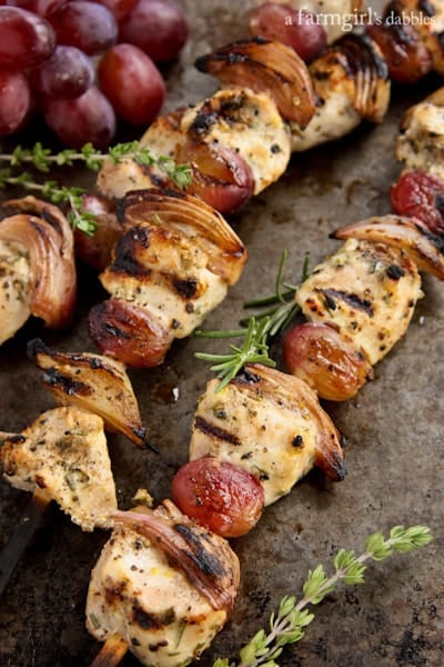 skewers of grilled chicken, shallots, and grapes