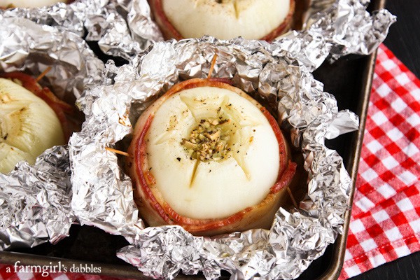 vidalia onion wrapped in bacon and cooked in tin foil