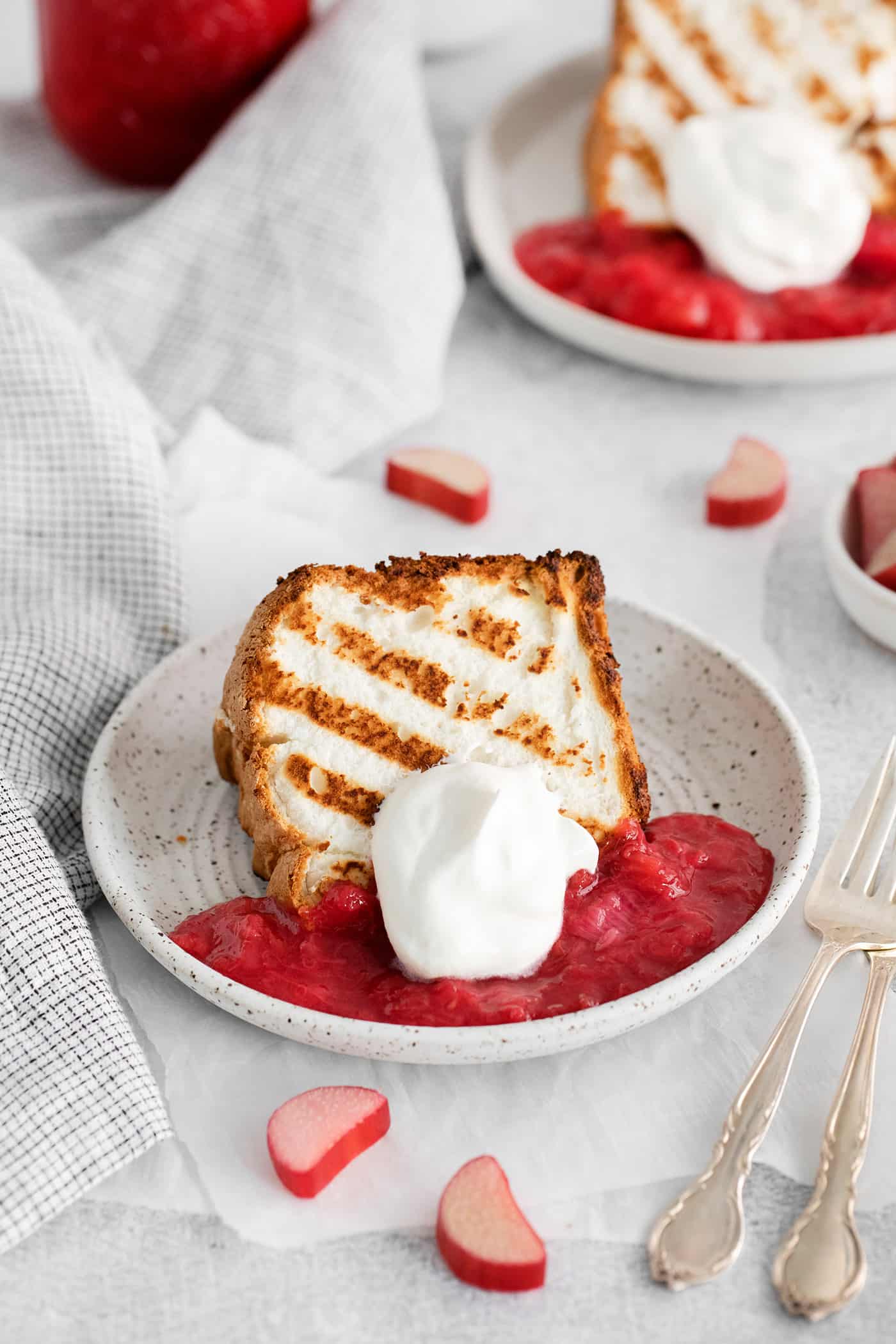 A slice of grilled angel food cake on a plate