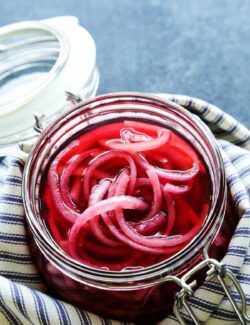 a jar of pickled red onions