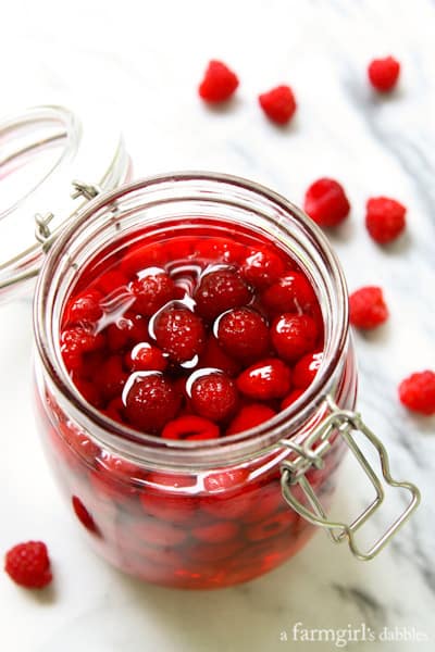 a jar of Homemade Raspberry Vinegar made with fresh raspberries