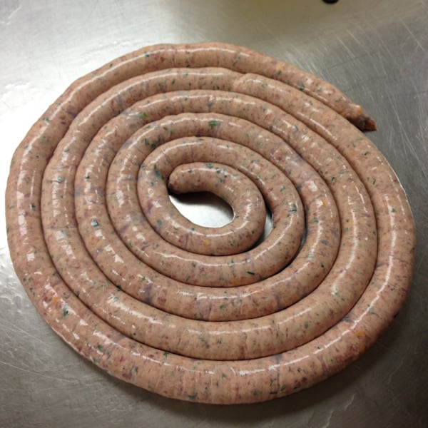 an uncooked cheddarwurst