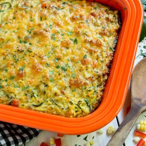 Top view of cheesy zucchini noodles bake in a casserole dish