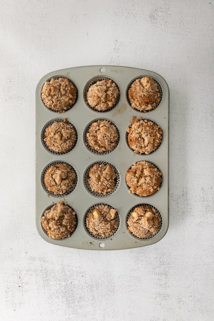 Apple muffins in a muffin tin