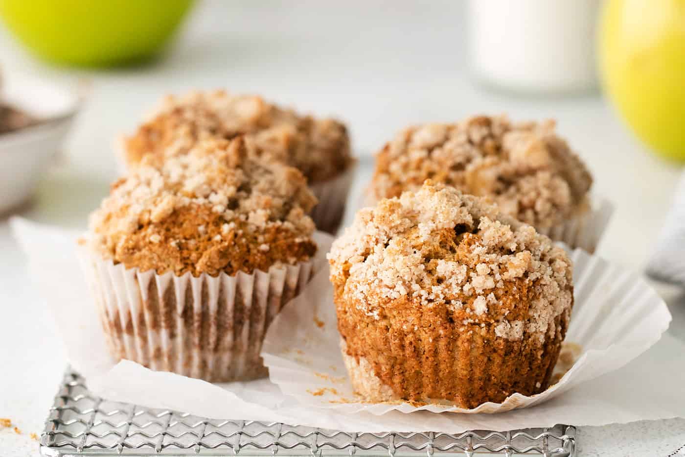 Four muffins with cinnamon sugar topping