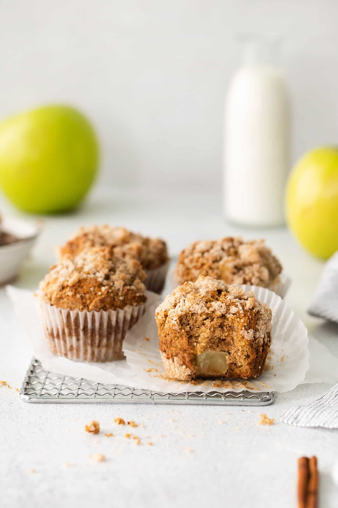 Four muffins with cinnamon sugar topping