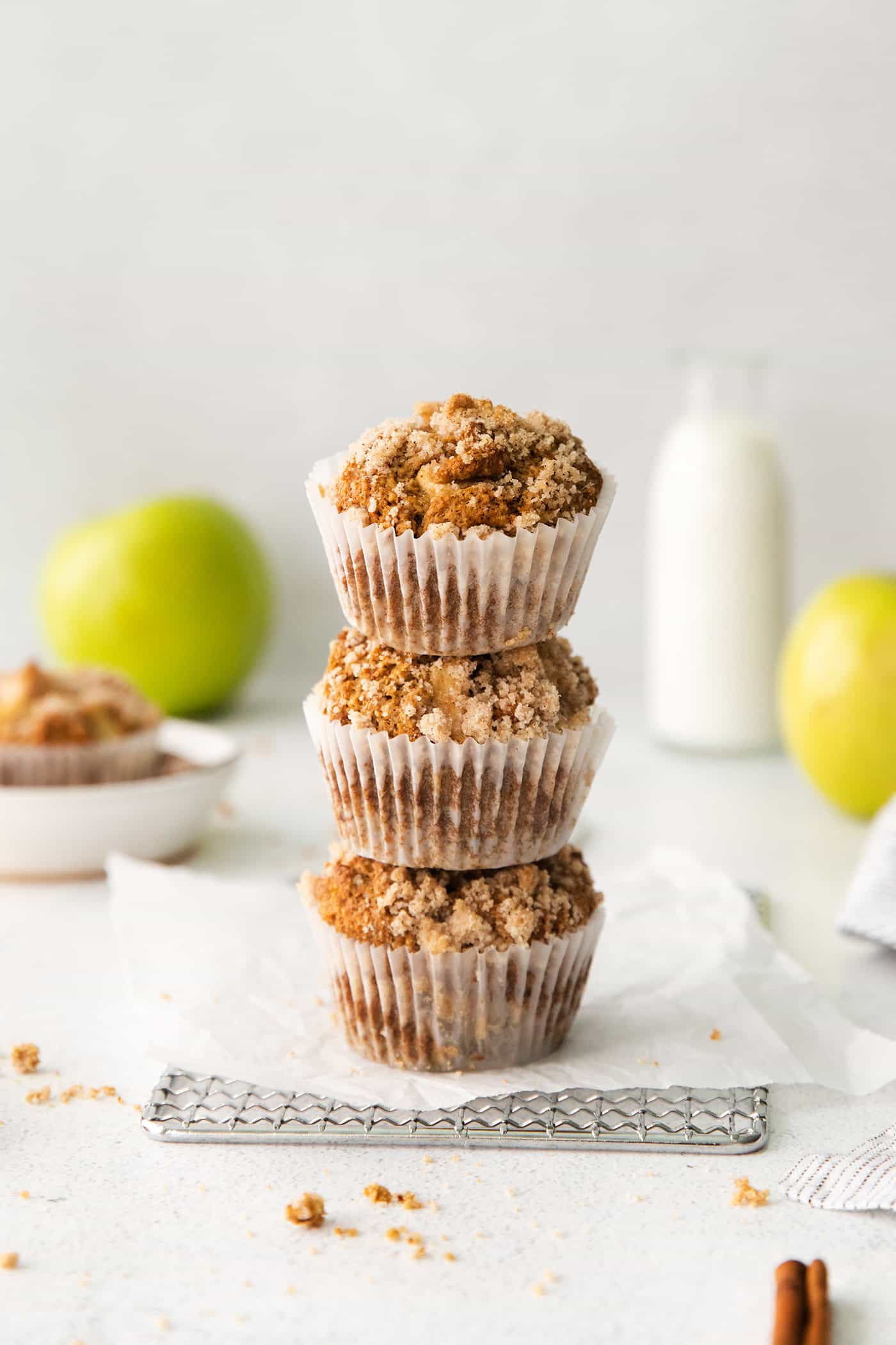 Three apple muffins stacked on top of each other