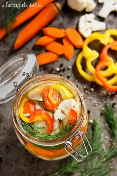 a large mason jar filled with Pickled Vegetables