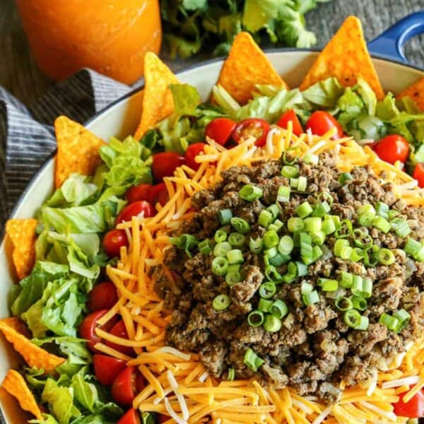 salad with taco ingredients layered on top