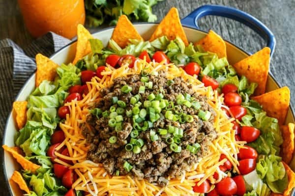 Dorito taco salad in a large blue bowl