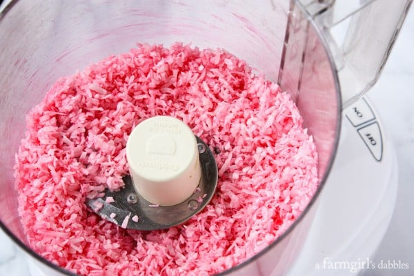 pink coconut in a food processor