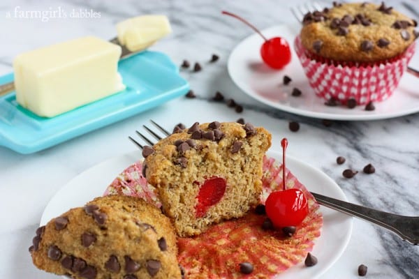 Banana Muffins with Chocolate on top and a Cherry in the middle