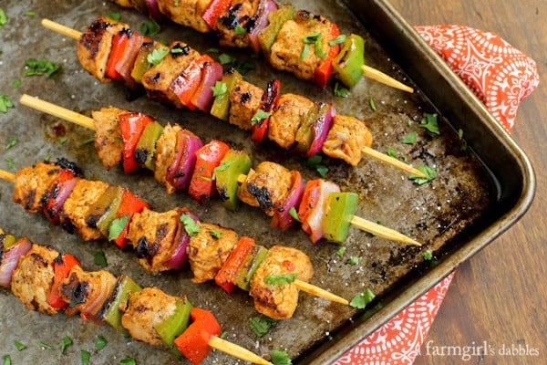 Charmoula Pork Kebabs with onions and bell peppers