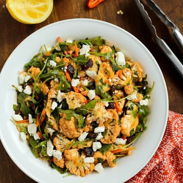 North African Cauliflower Salad with Charmoula Dressing in a white bowl