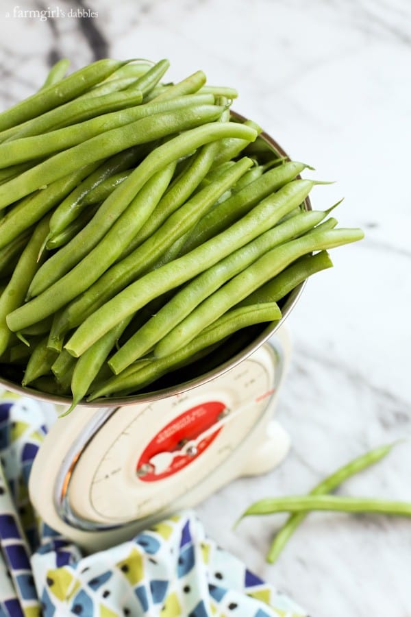 uncooked green beans on a scale