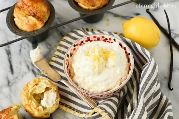 Whipped Lemon Butter spread onto a popover