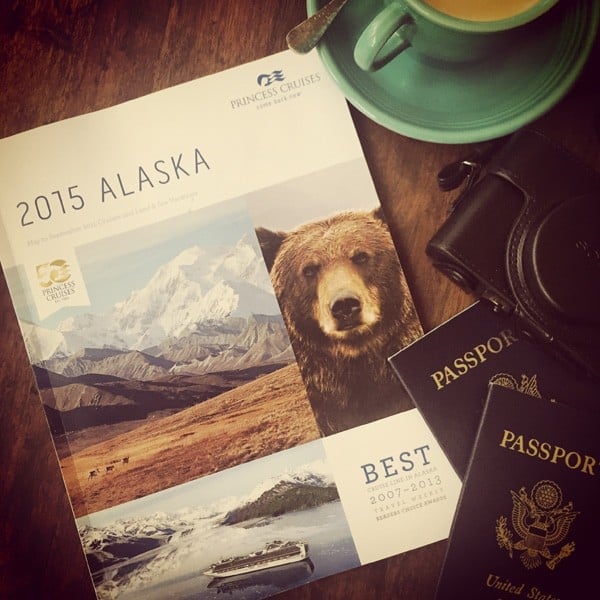 alaska travel guide with two U.S. passports