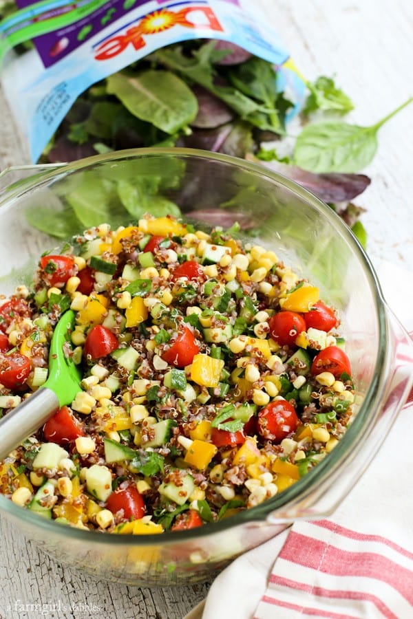 a glass bowl of Quinoa and mixed Vegetables