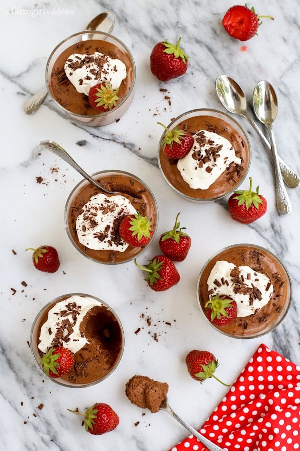 a Mousse Cups with a spoonful taken out