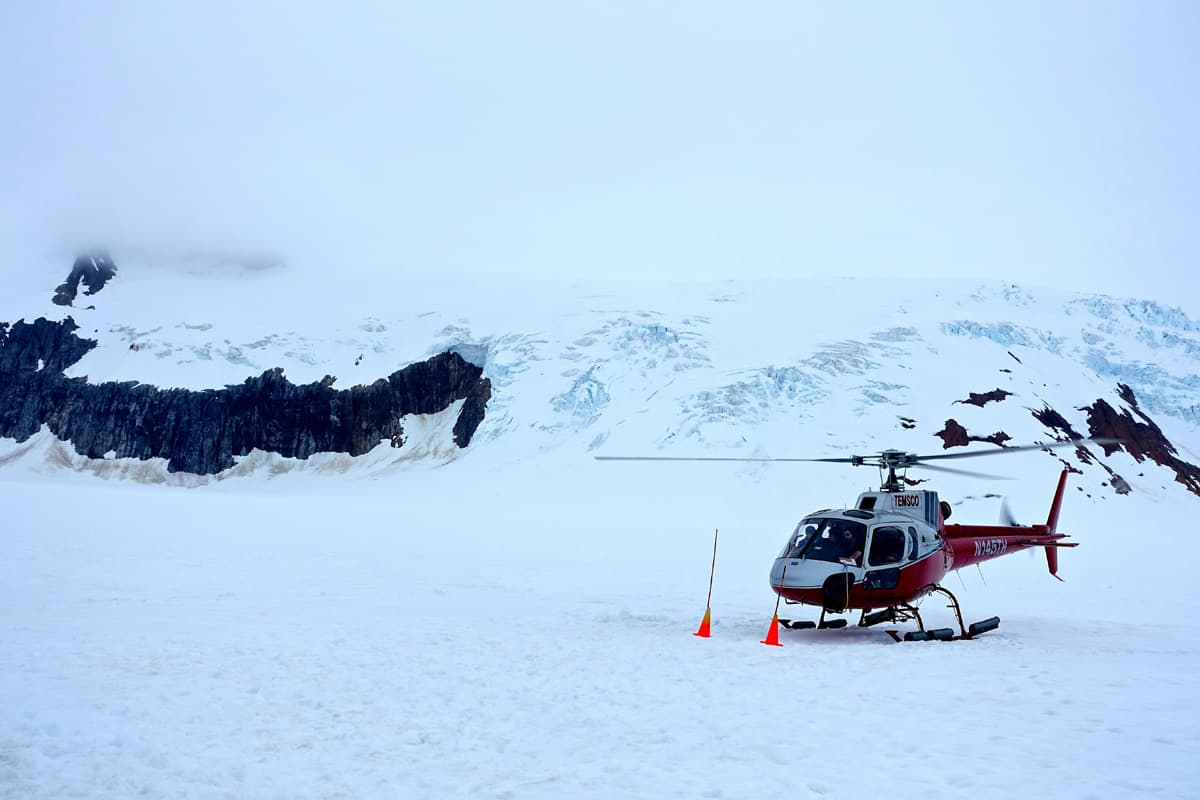 a helicopter on top of Mendenhall Glacier