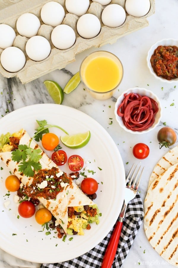 a carton of eggs with a stack of tortillas and a Huevos Rancheros Wrap