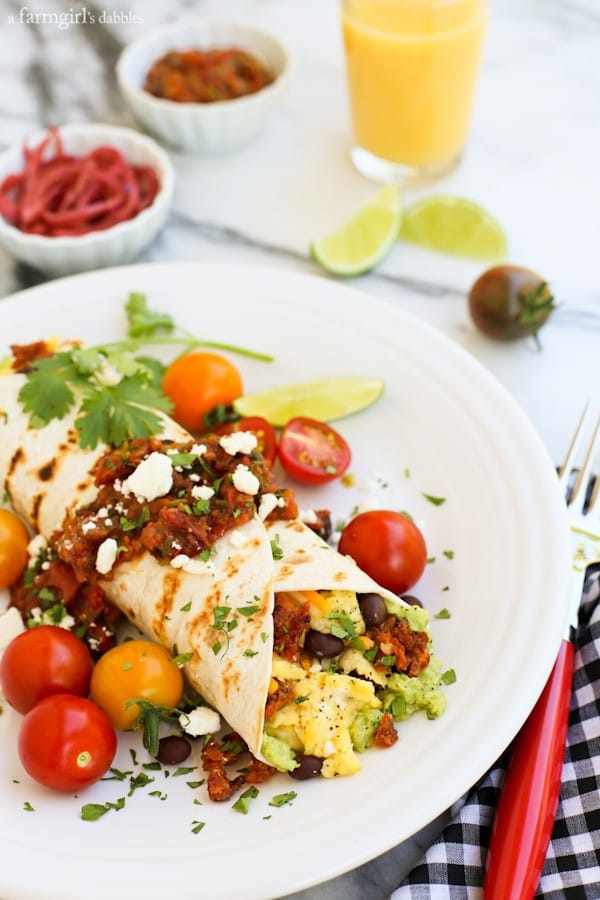 breakfast Wraps with eggs, tomatoes, beans, guacamole, and cheese