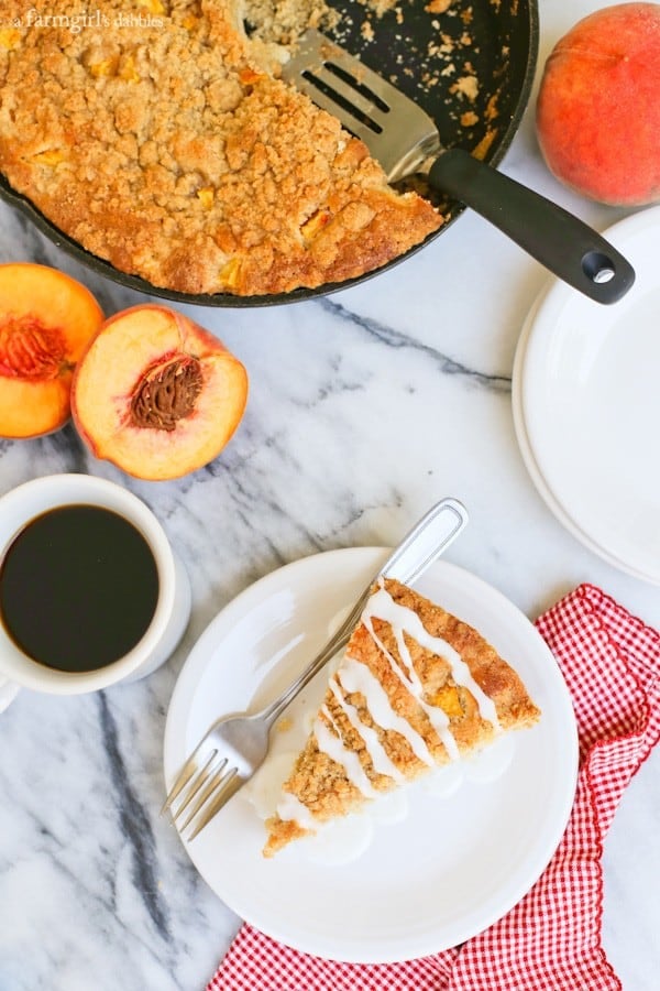 a slice of Coffee Cake with glaze on a white plate