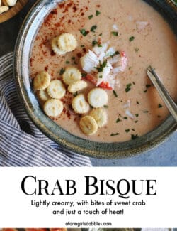 A photo of crab bisque with oyster crackers