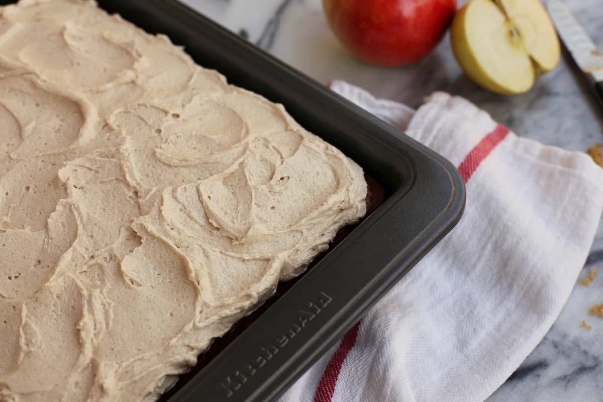 Frosted apple cake in a pan