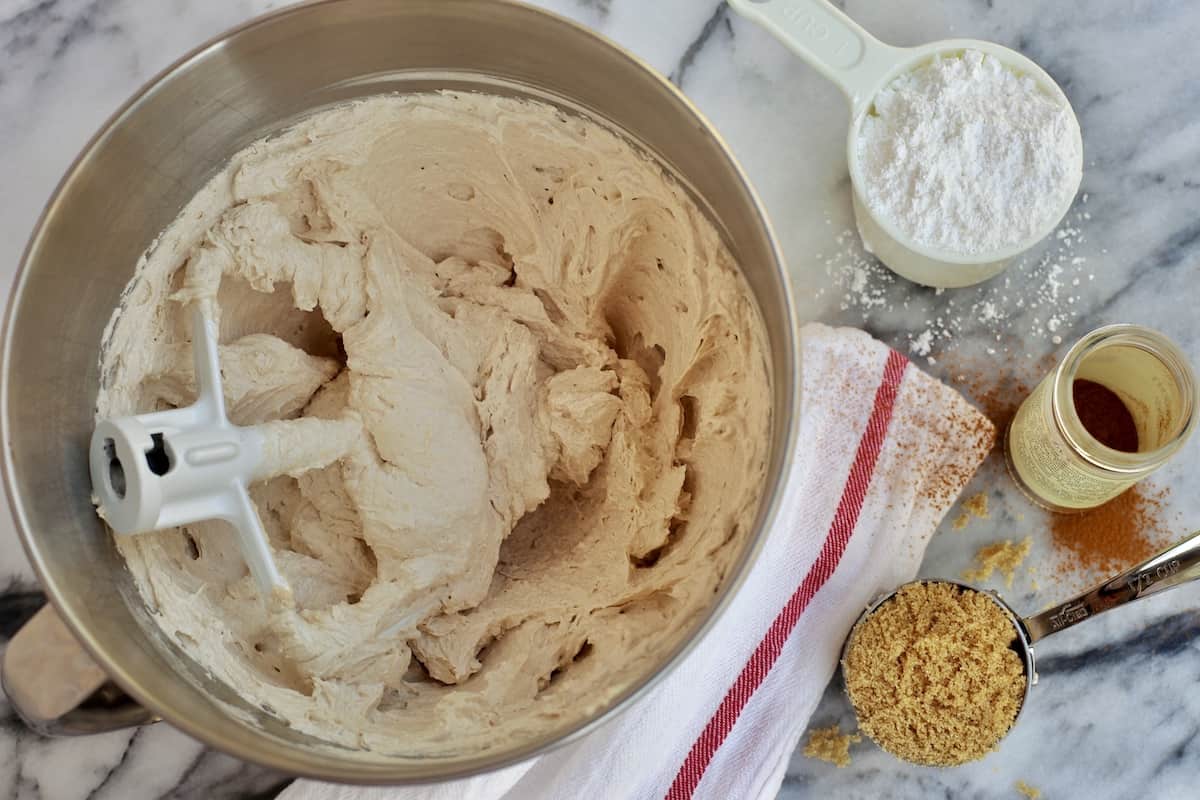 A bowl of cake batter on a counter