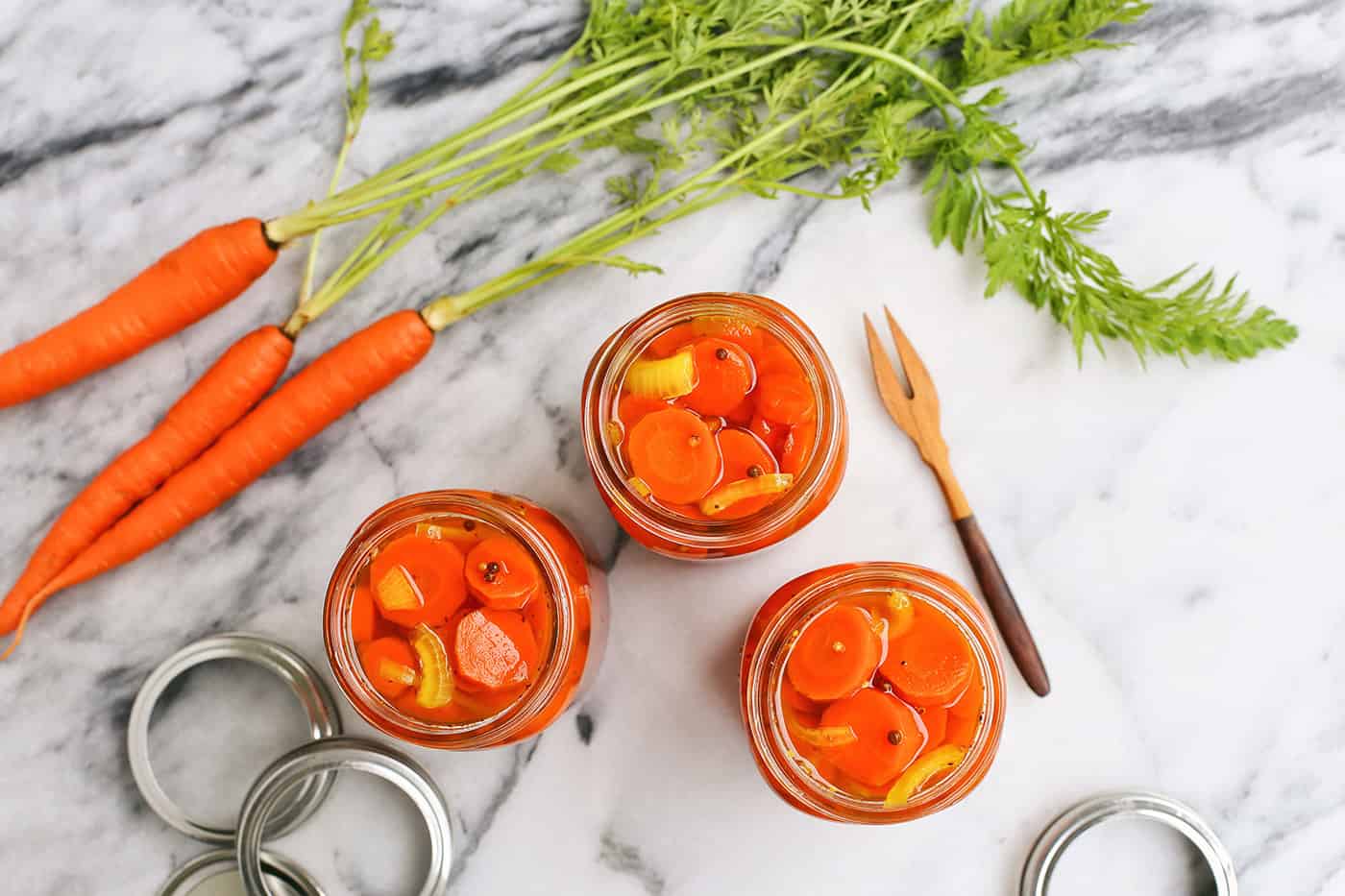 Three jars of quick pickled carrots