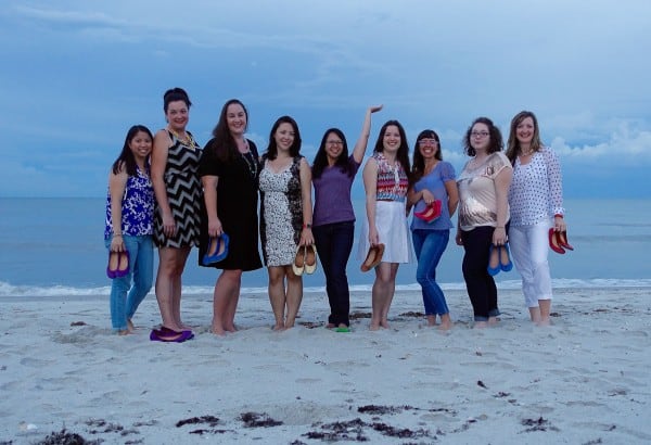 a group of women on the beach