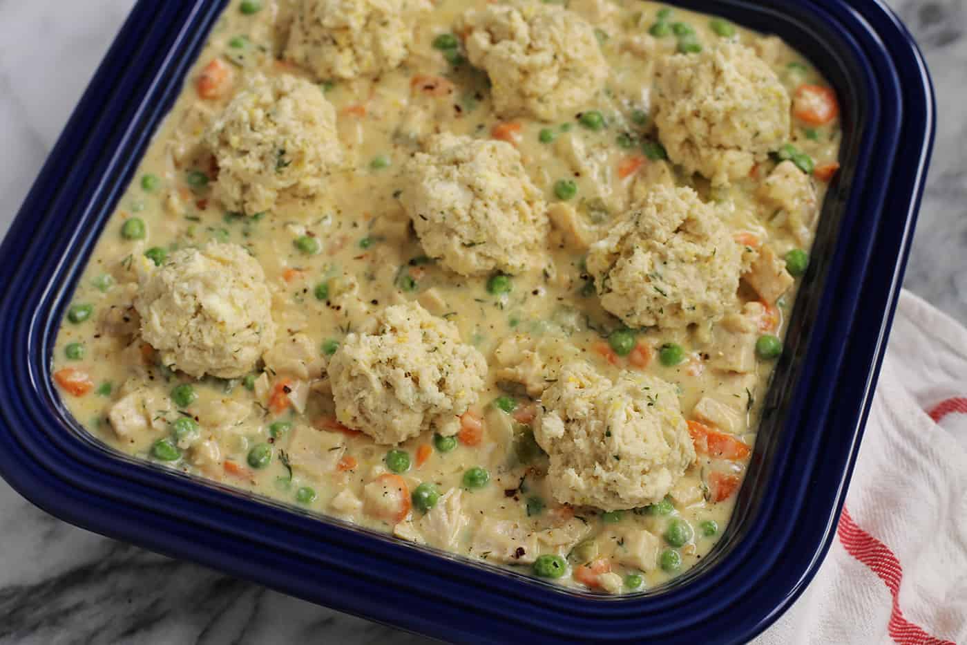 Turkey and biscuits casserole in a square baking dish
