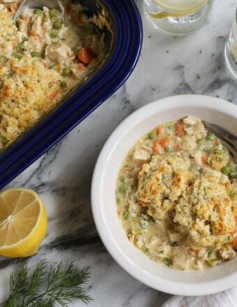 A serving of leftover turkey casserole with biscuits in a bowl