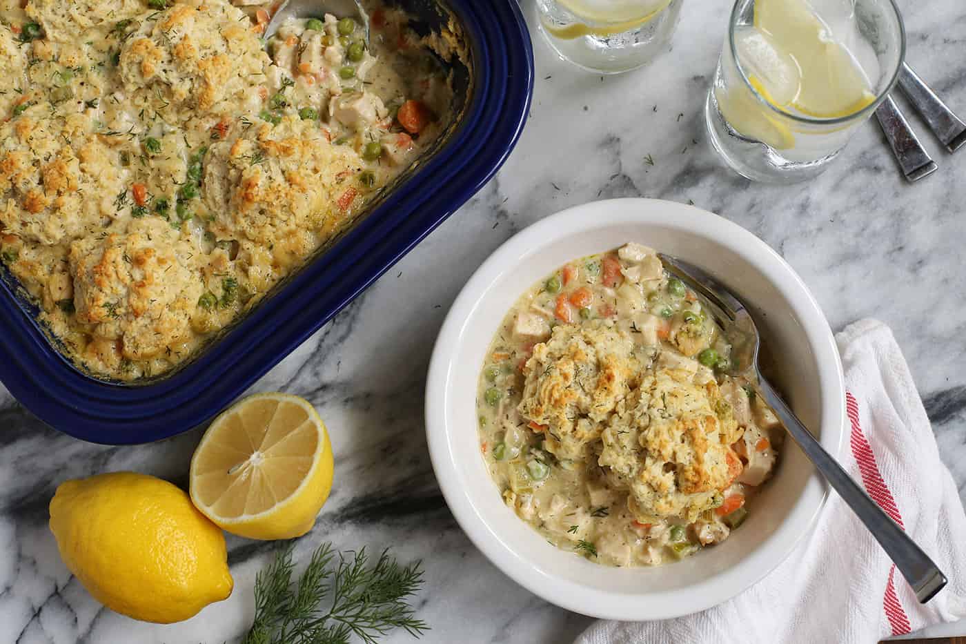 A serving of leftover turkey casserole with biscuits in a bowl