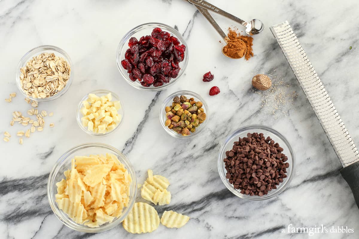 oats, potato chips, white chocolate, pistachios, cranberries, mini chocolate chips, and nutmeg