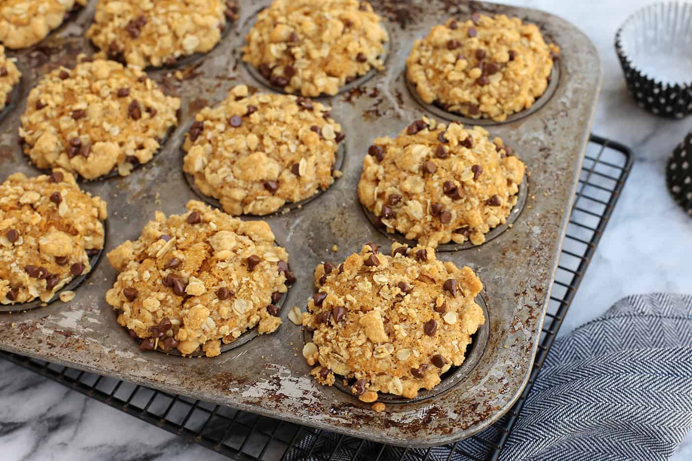 Pumpkin streusel muffins in a muffin tin