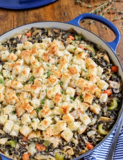 Chicken wild rice casserole in a blue casserole dish