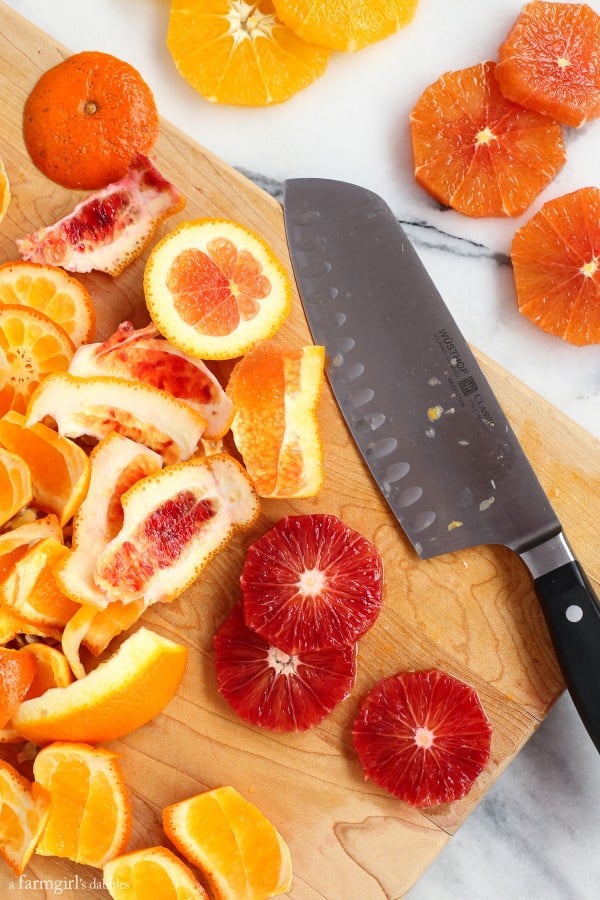 sliced oranges on a cutting board