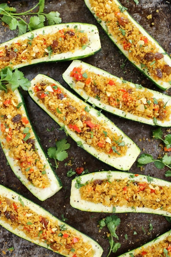 Stuffed Zucchini on a baking pan with fresh cilantro