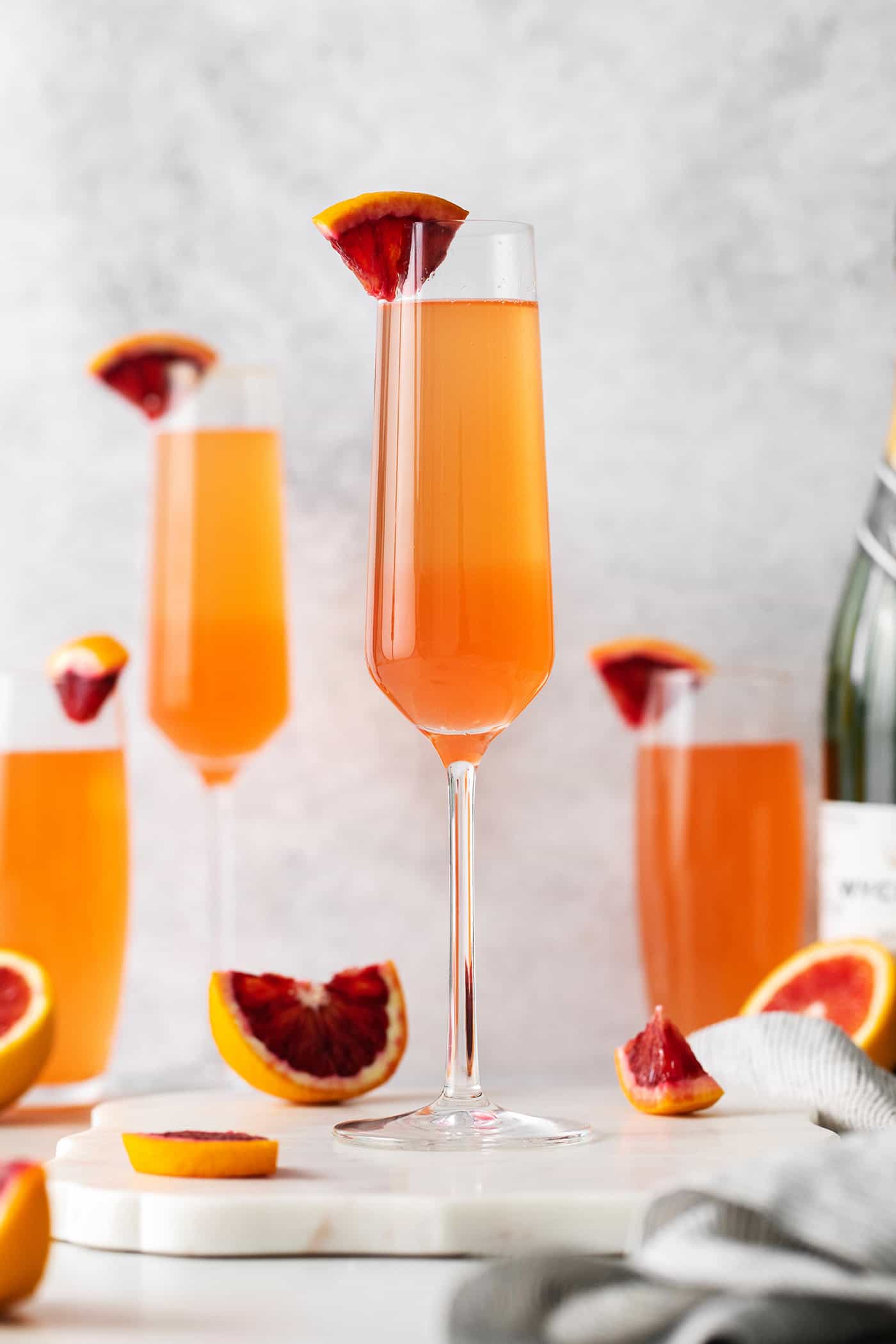 This Blood Orange Mimosa with St. Germain is bursting with fresh, bright flavor. It's super simple to make and the gorgeous color! Blood orange mimosas