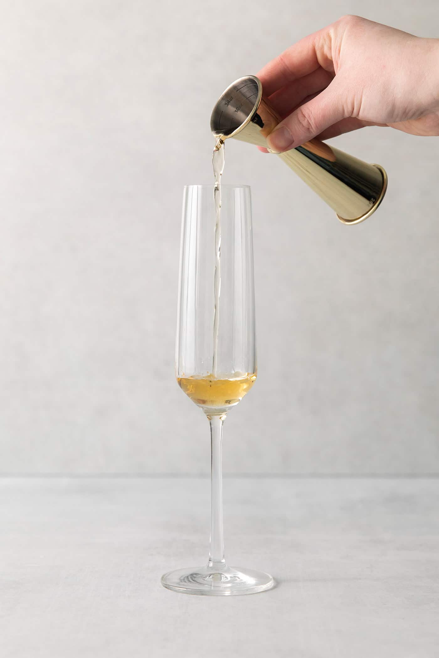 St Germain being poured into a champagne flute