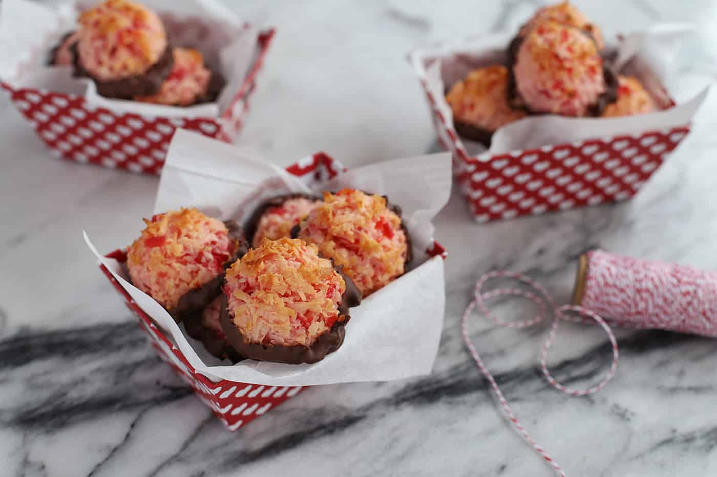 Cherry chocolate macaroons in gift boxes