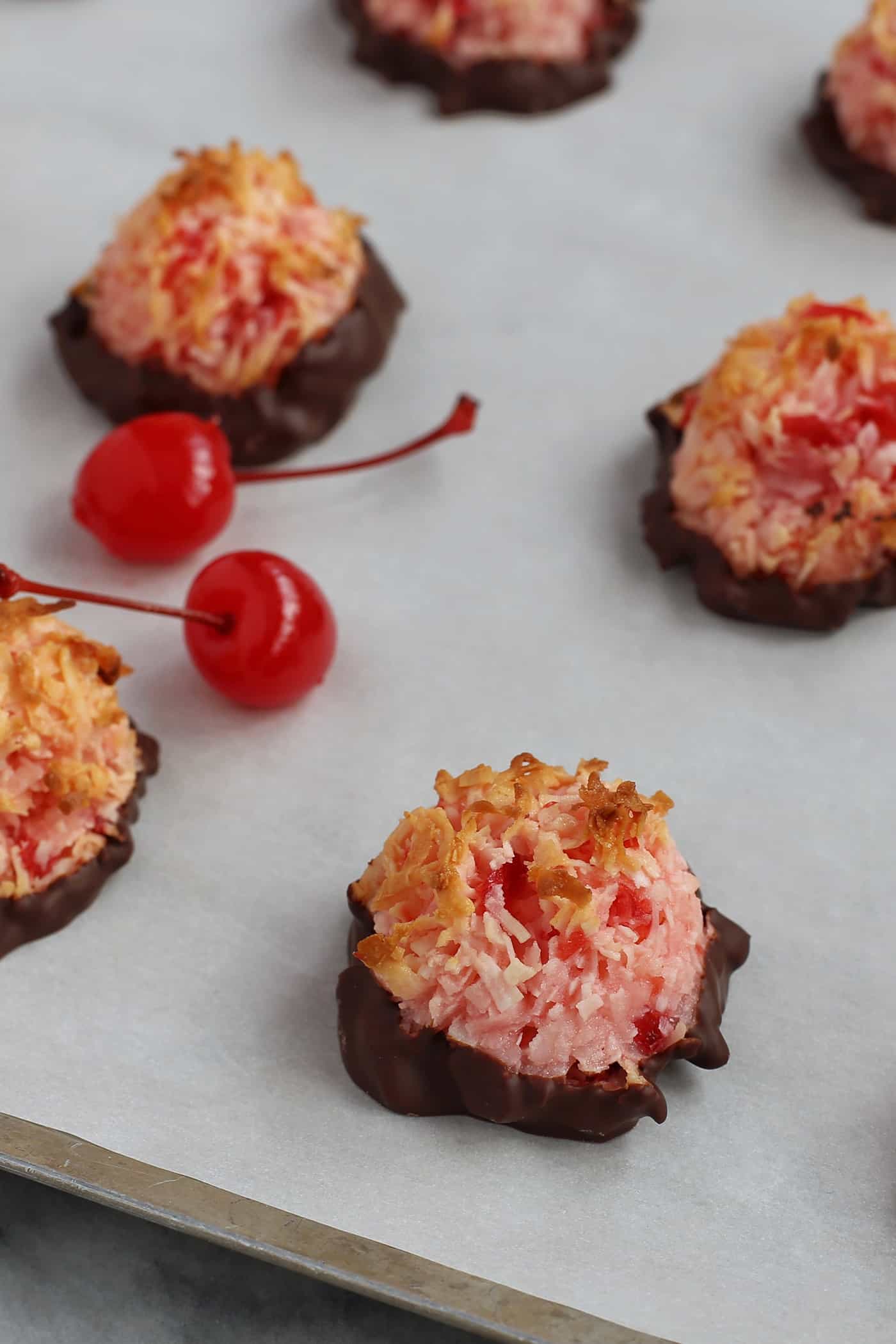 Cherry chocolate macaroons on a baking dish