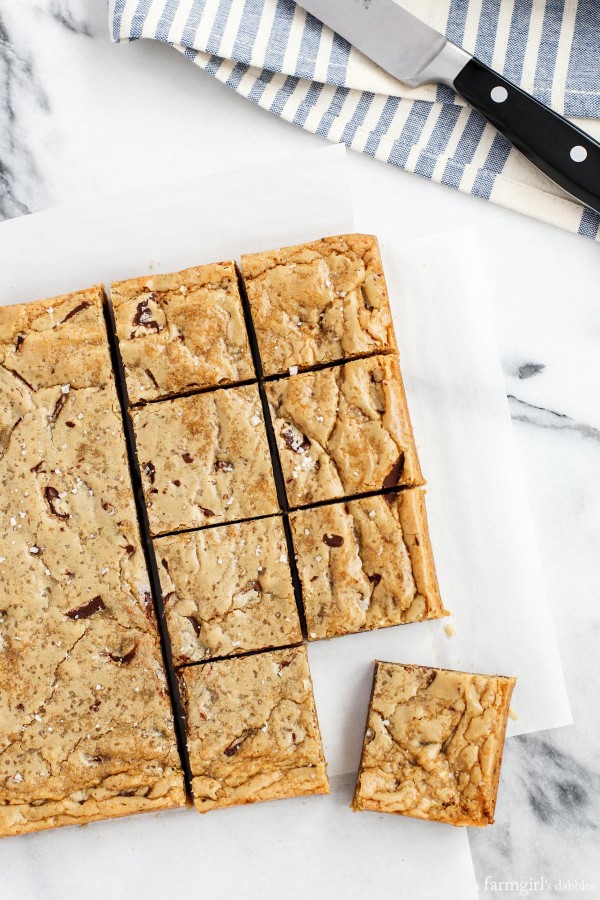 blondies cut into squares on a marble counter