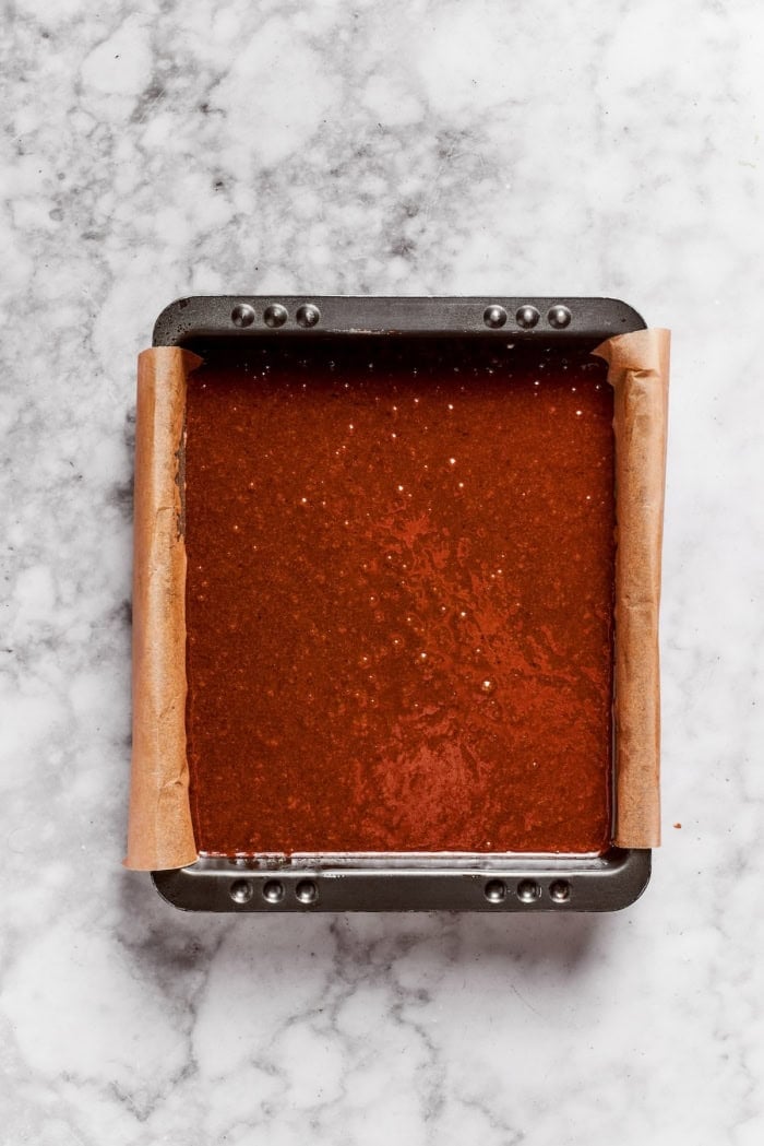 Brownie batter in pan.