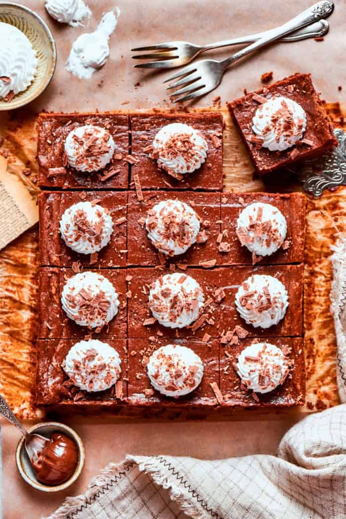 Sliced Nutella cheesecake bars on countertop.