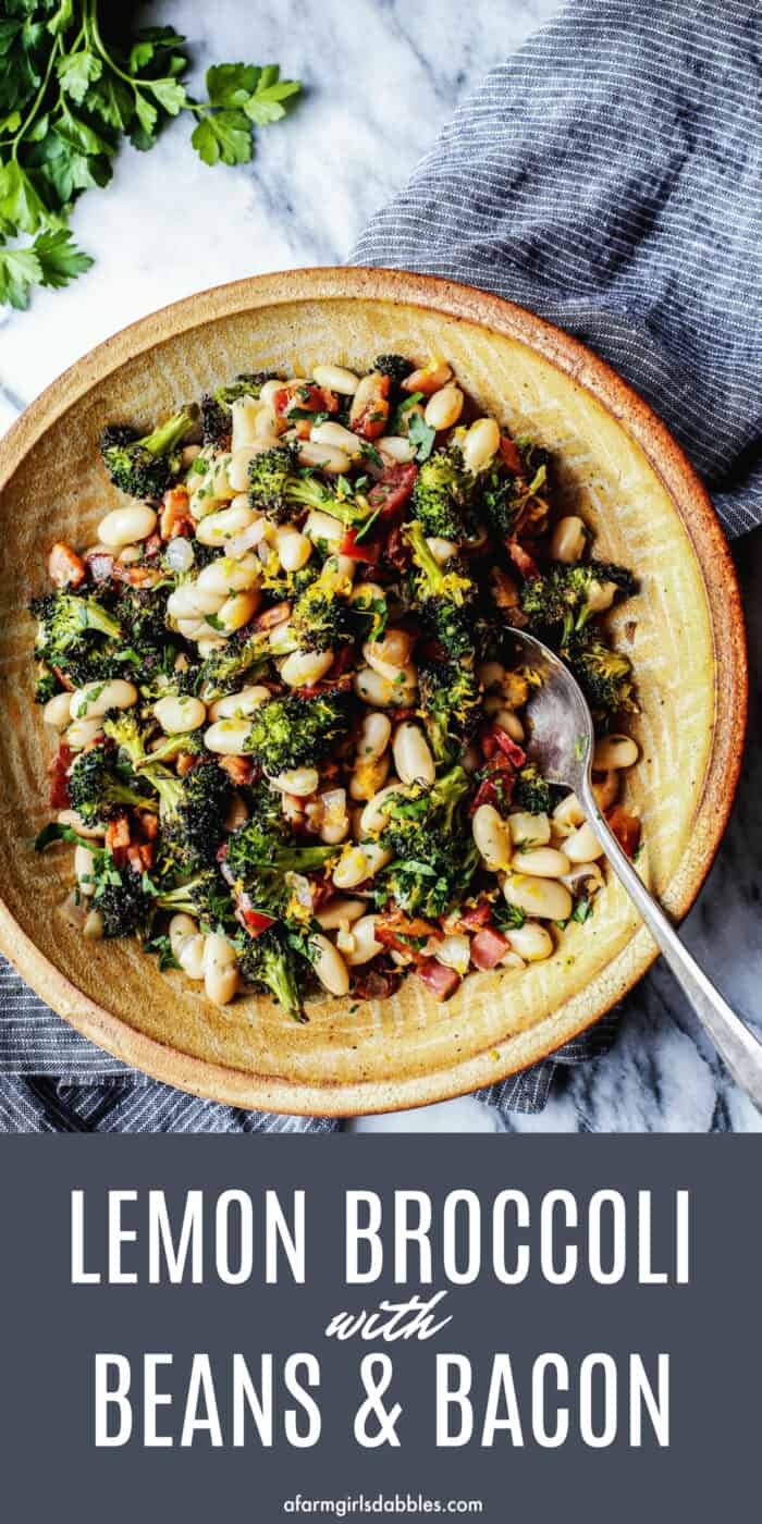 pinterest image of a pottery bowl with great northern white beans, roasted broccoli, fried bacon, and lemon zest