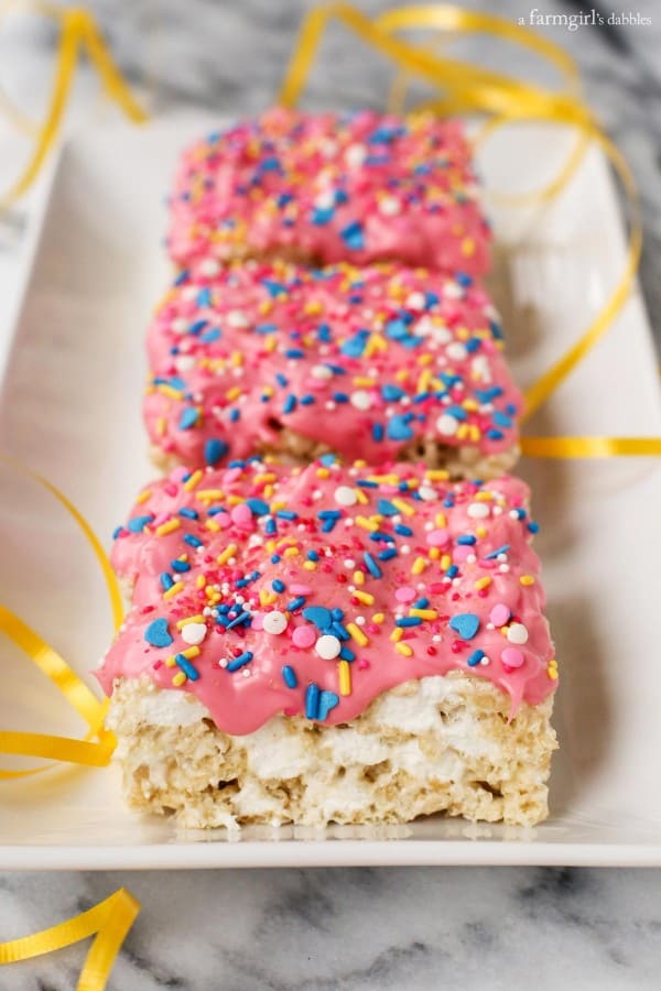 Extra-Marshmallow Rice Krispies Bars with Confetti and yellow ribbon